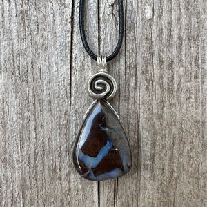 Boulder Opal Holds Earth, Water and Fire Elements. Brings a Zest Life.